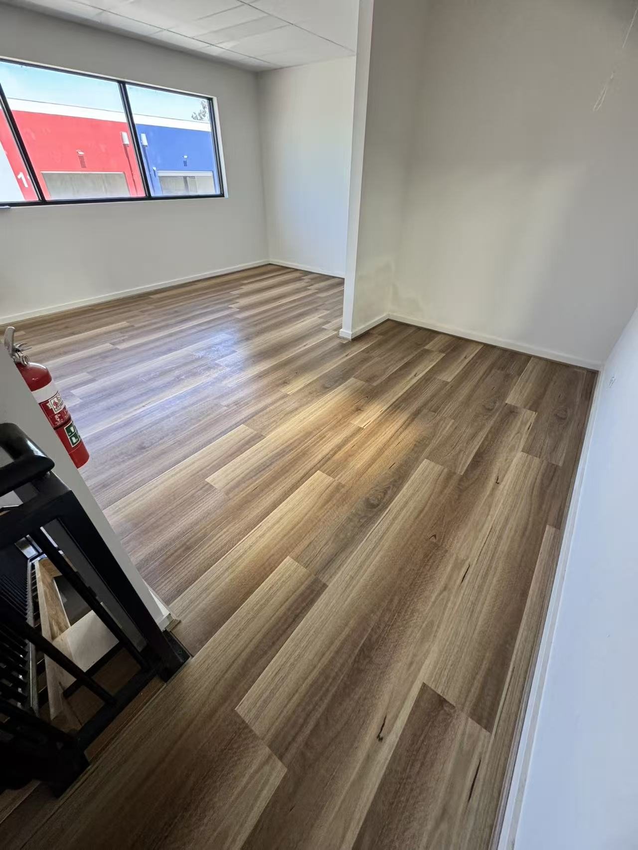 Angled view of the finished room showing the completed flooring.